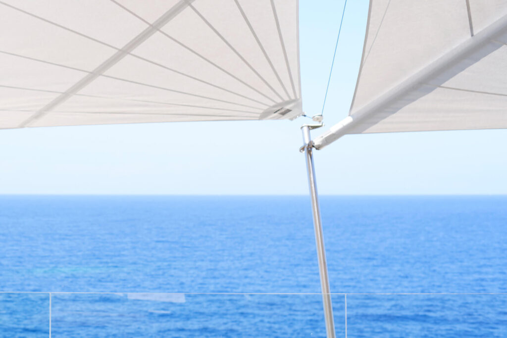 Sun Sail Soltis technical fabric detail — 15-year durability versus 3–5 year replacement cycle of generic shade products, long-term value comparison Mallorca and Ibiza