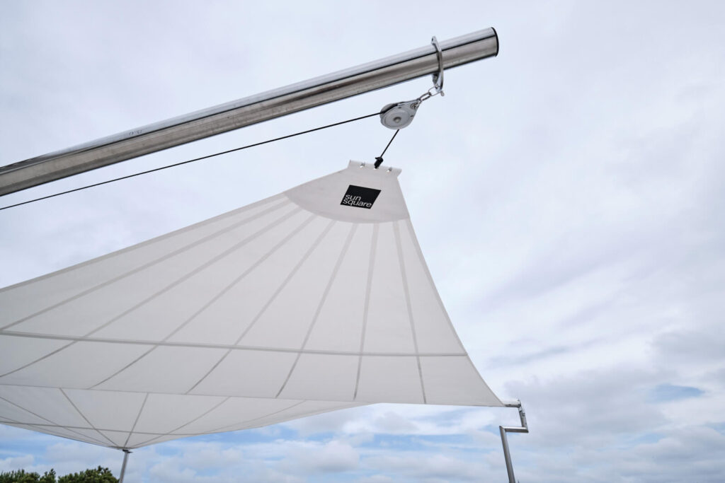 Sun Sail 150 m² modular installation — two coordinated 80 m² sails covering 30 sun lounge position