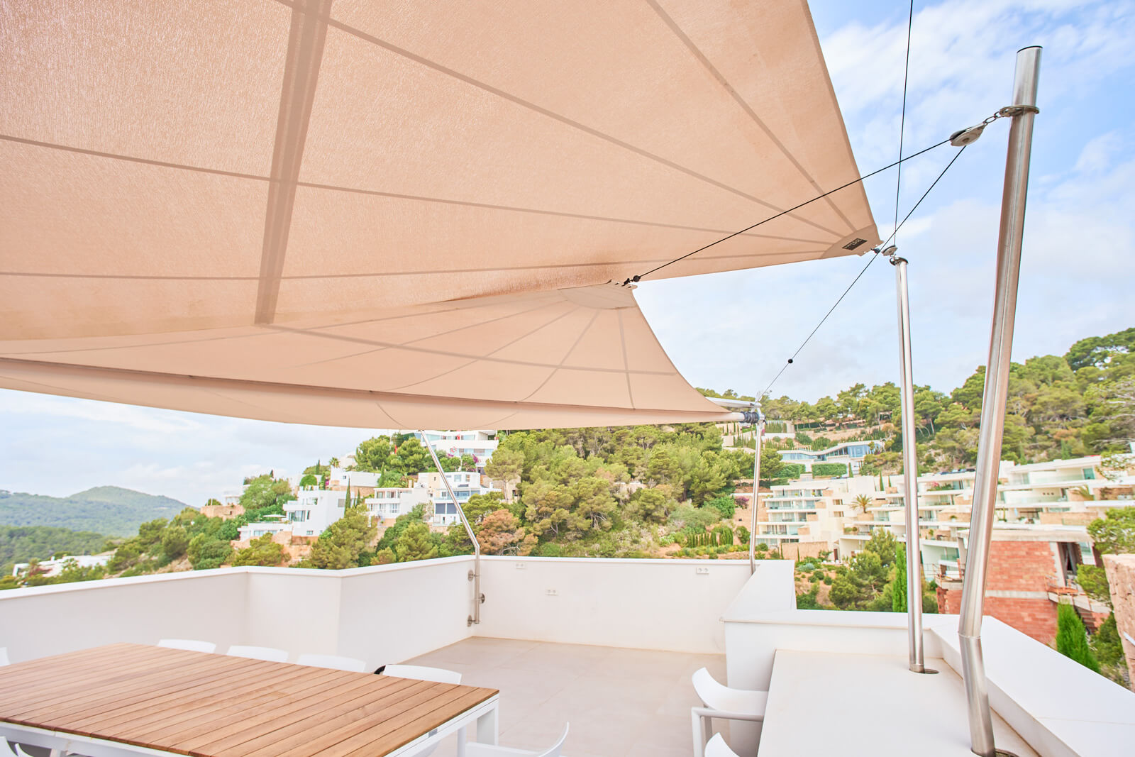 Sun Sail structural profile and V4A marine stainless steel fixing detail at Mediterranean villa, engineered for 25-year performance and low Balearic maintenance