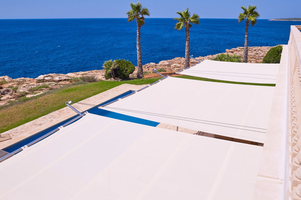 Sun Sail marine-grade Soltis 92 fabric and structural components — engineered for Mallorca salt air, UV radiation and thermal cycling, 10-year fabric warranty from Serge Ferrari