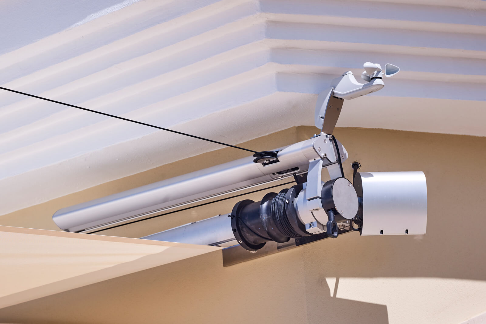 Sun Sail automatic anemometer triggering sail retraction during Poniente wind event in Ibiza, real-time wind sensor response