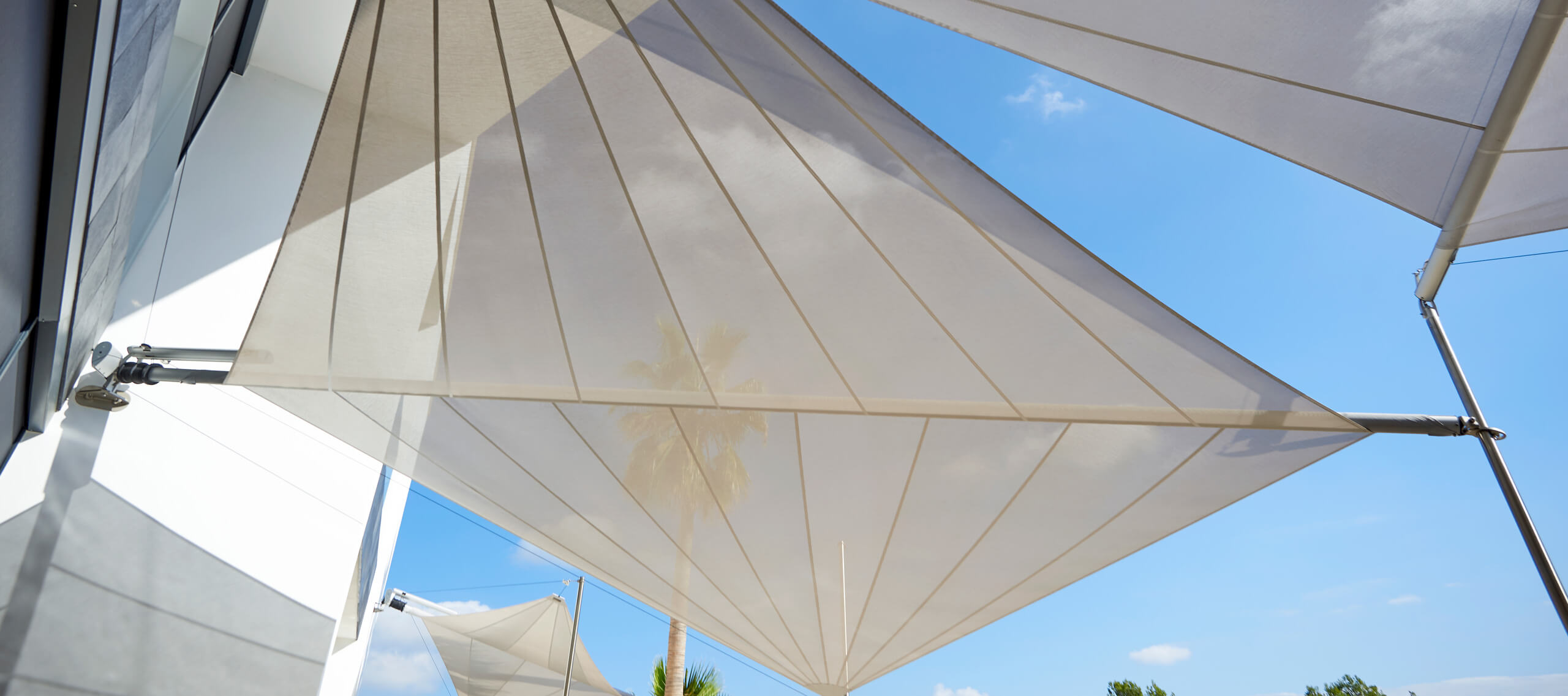 SunSquare automatic rain and sun protection sail on luxury villa terrace, Mallorca