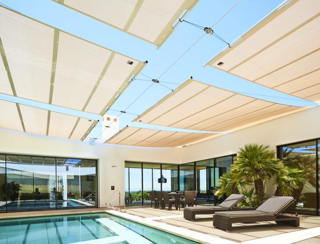 Interior Villa patio motorized covering for sun protection, wind and rain. Privacy.